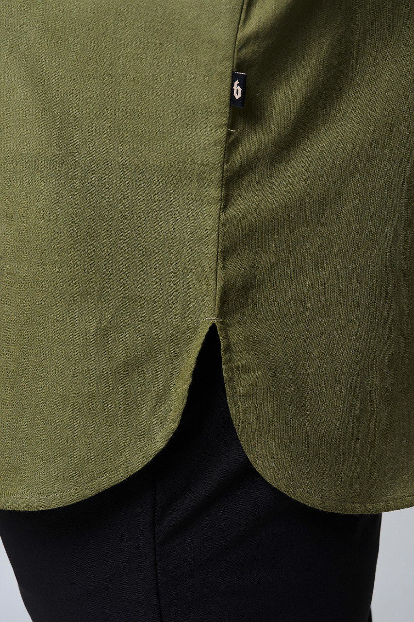 Close-up of a slits with curve hemline #color_olive green