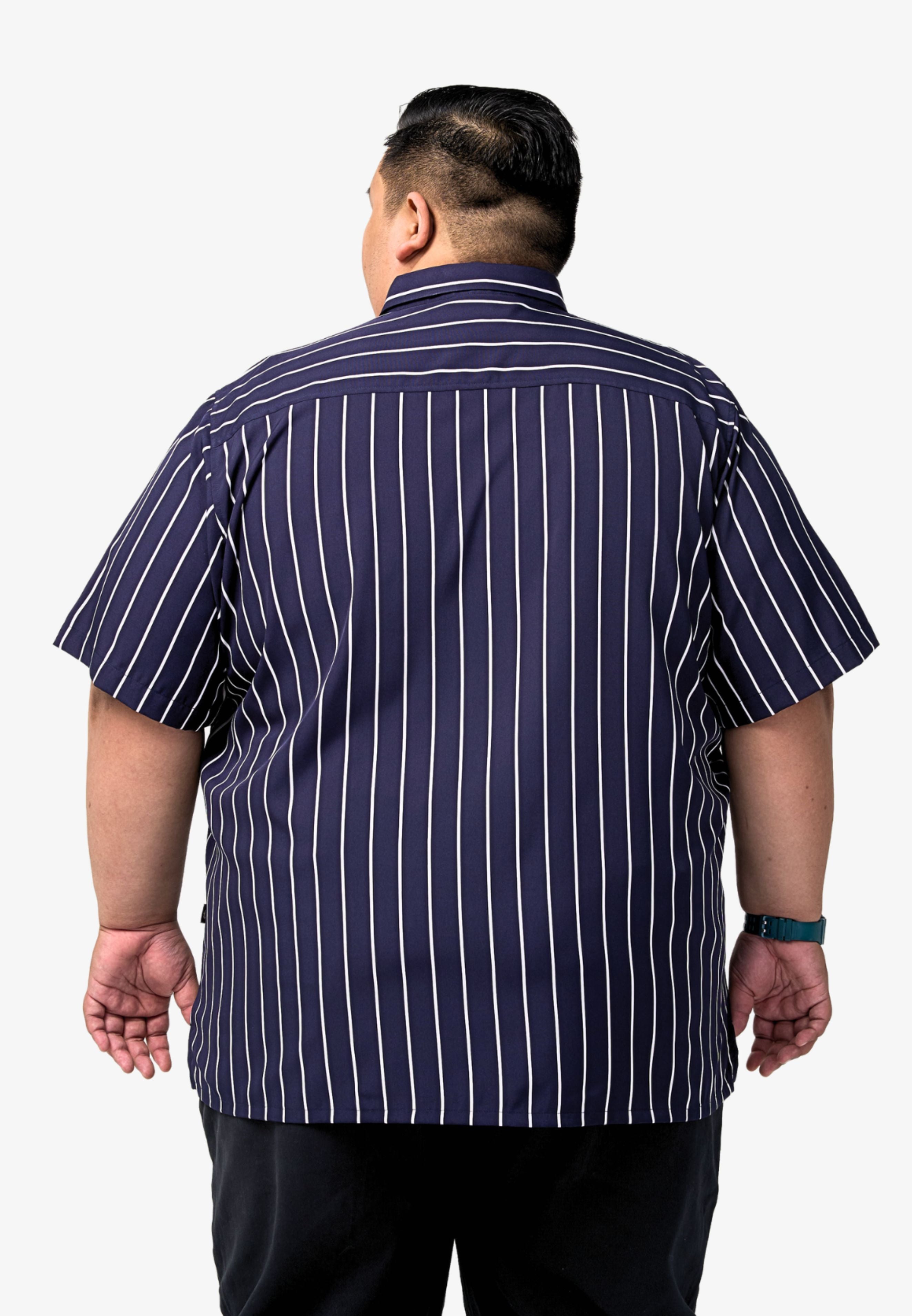 A picture of the back of the shirt worn by a male plus-size model in a dark blue shirt with white stripes. #color_dark blue