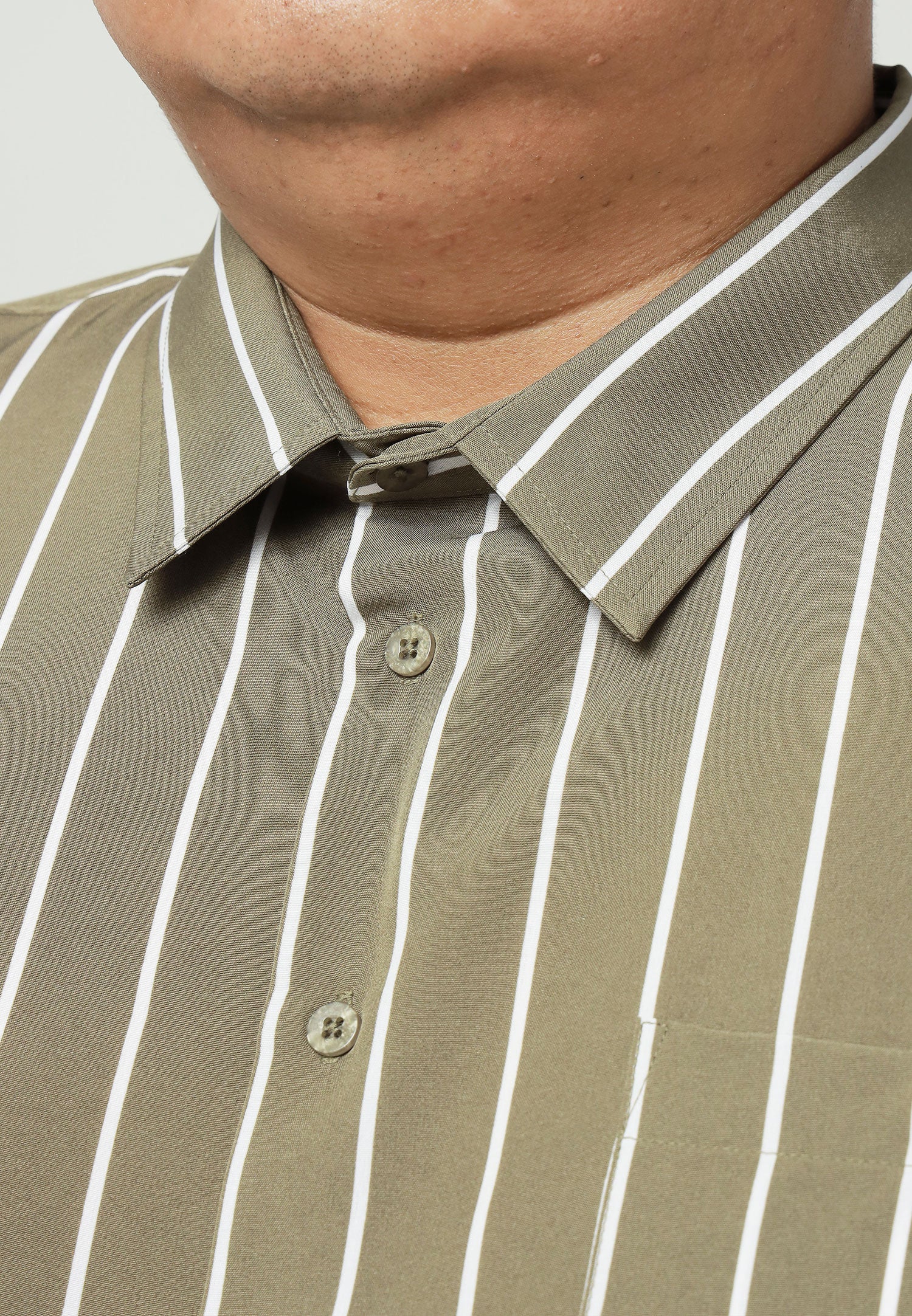 A close up of pointed collarfor olive green shirt with white stripes #color_olive green